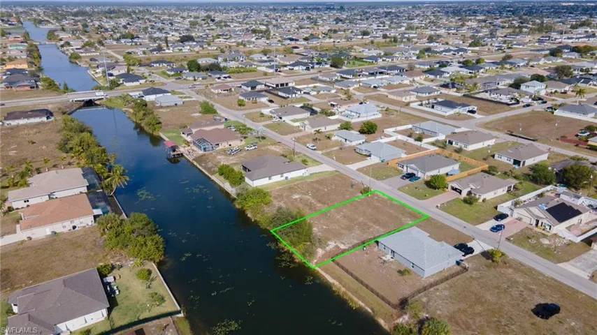View of property location with nearby suburban area and property parcel outlined