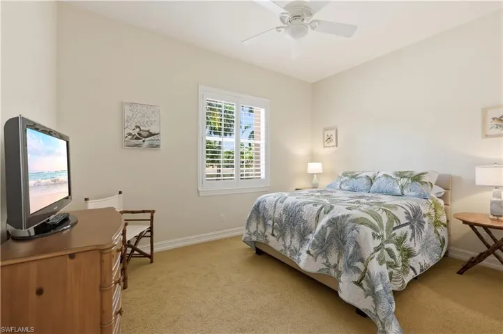 Guest bedroom with sitting area.