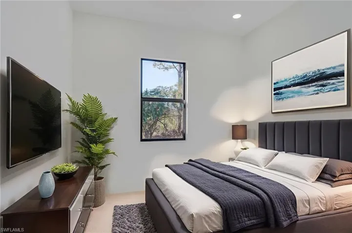 Bedroom with recessed lighting