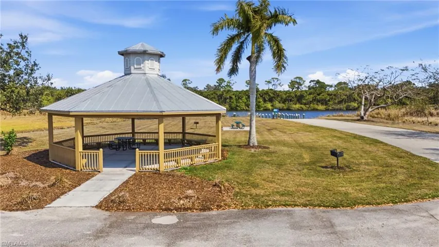 View of community with a water view, and a gazebo