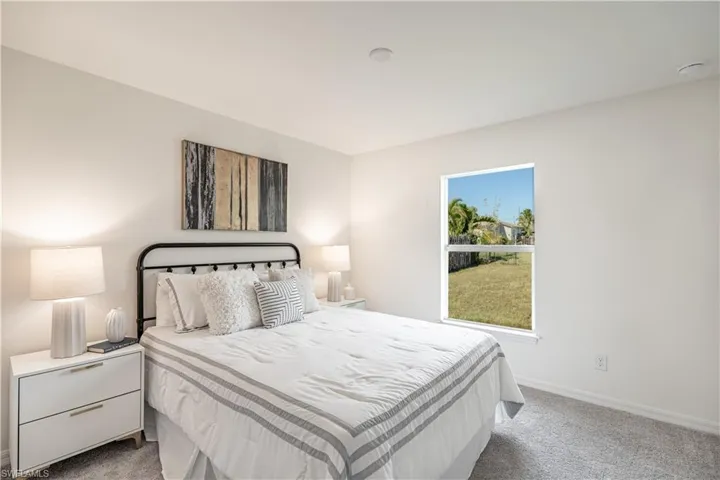 Bedroom featuring carpet floors