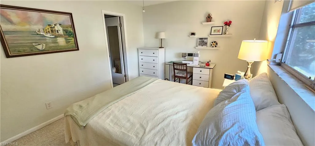 Bedroom with carpet