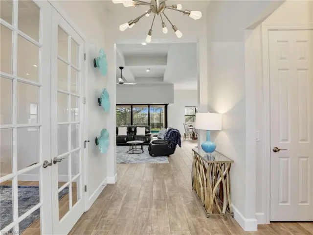 Foyer with French doors leading to den/office