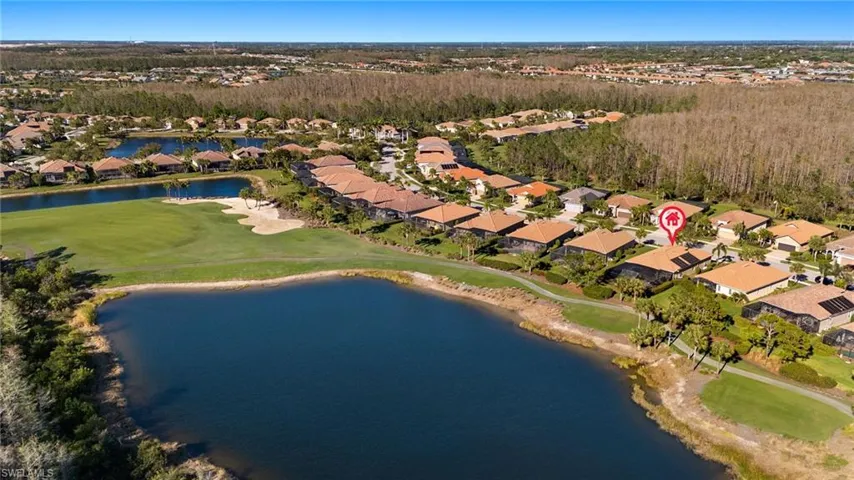 Aerial view with a residential view and a water view