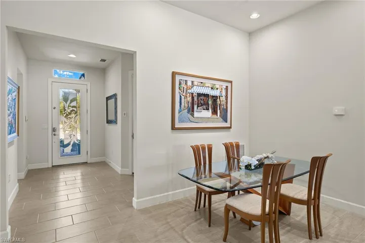Dining room with visible vents, recessed lighting, baseboards, and wood finish floors