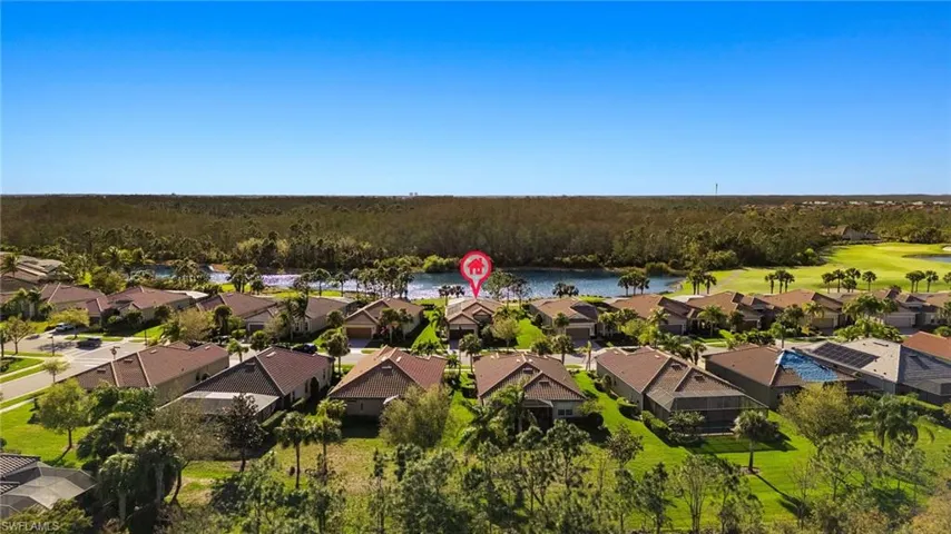 Aerial view with a residential view and a water view
