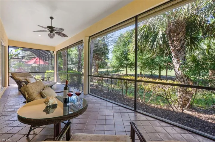 Sunroom featuring ceiling fan