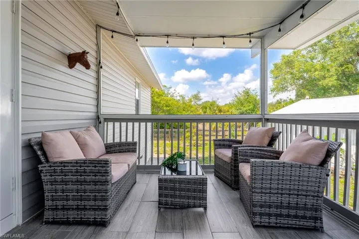 Wooden terrace with outdoor lounge area
