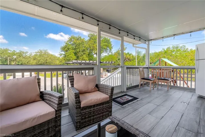 Deck featuring a playground