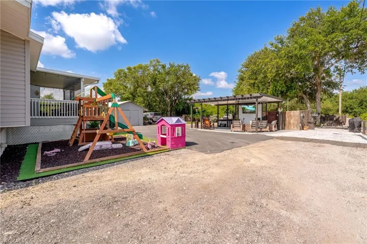 View of play area with a pergola