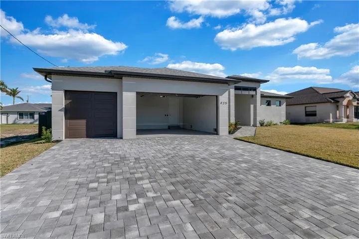 Garage with a lawn