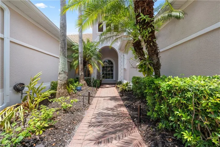 Property entrance with stucco siding