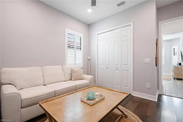 Living room featuring dark hardwood / wood-style floors