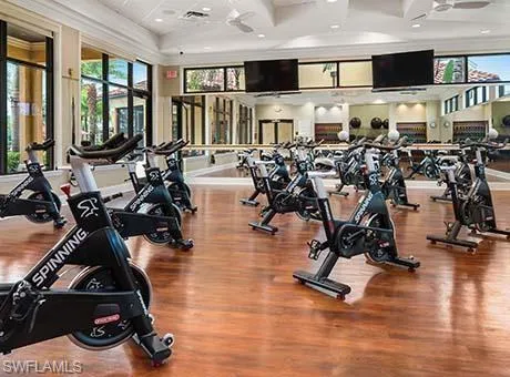 Exercise room featuring wood-type flooring