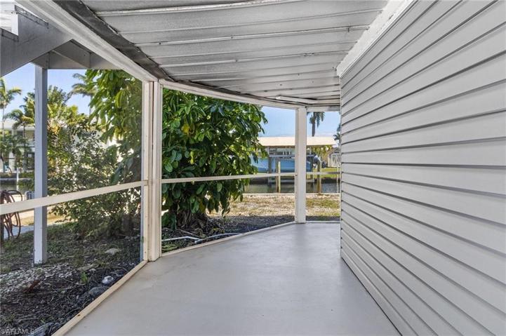 Ground Level Screened Porch.