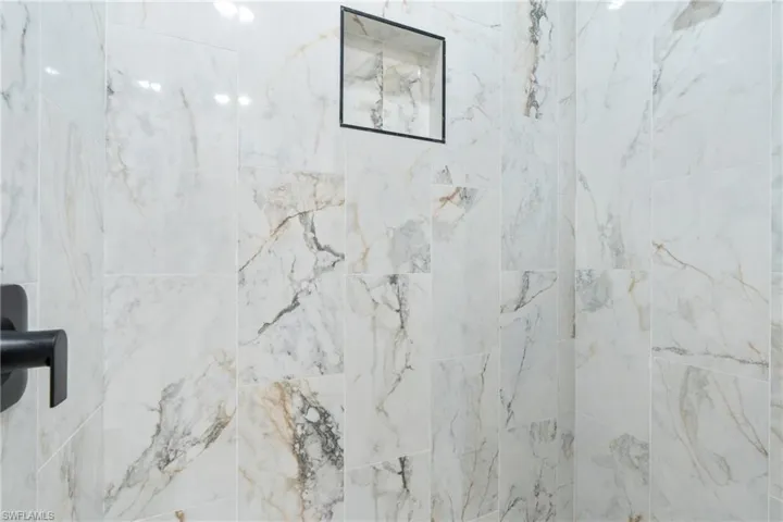 Bathroom with tiled shower