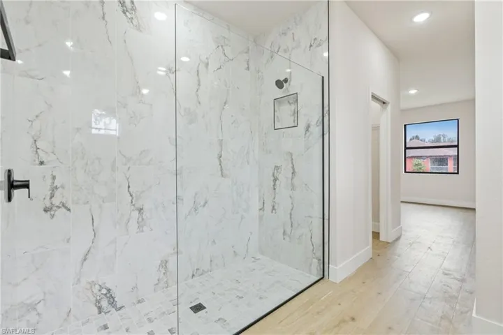 Master Bathroom with tiled shower