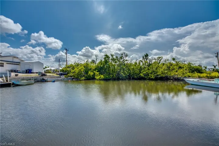Water view with a boat dock