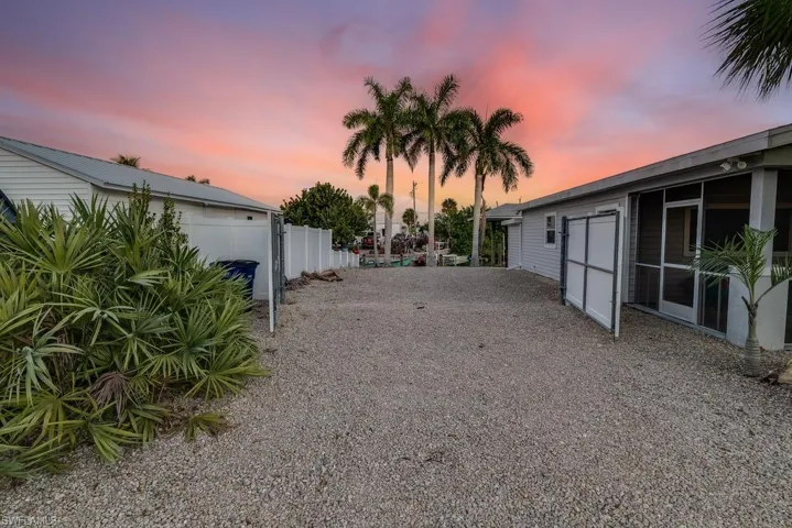 View of yard featuring a sunroom