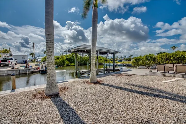 Dock with a water view and boat lift