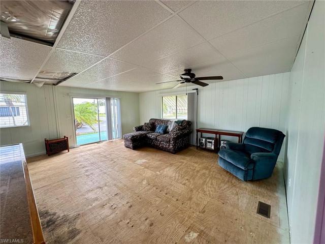 Living Room with Kitchen to the left.