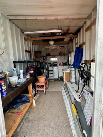 Washer, dryer, and laundry tub are conveniently located in the breezeway shed.