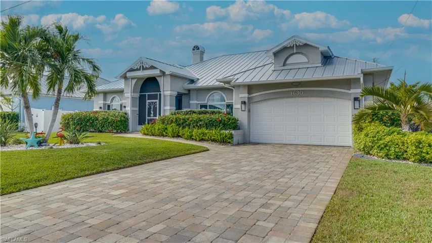 Welcome Home! 1630 NW 43rd Ave. Cape Coral, FL 33993