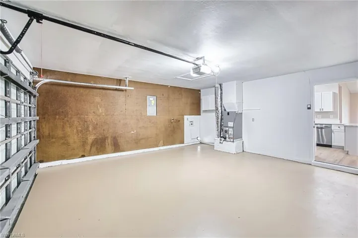 Garage with heating unit and a garage door opener