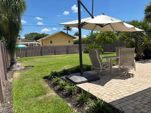 View of yard with a patio area