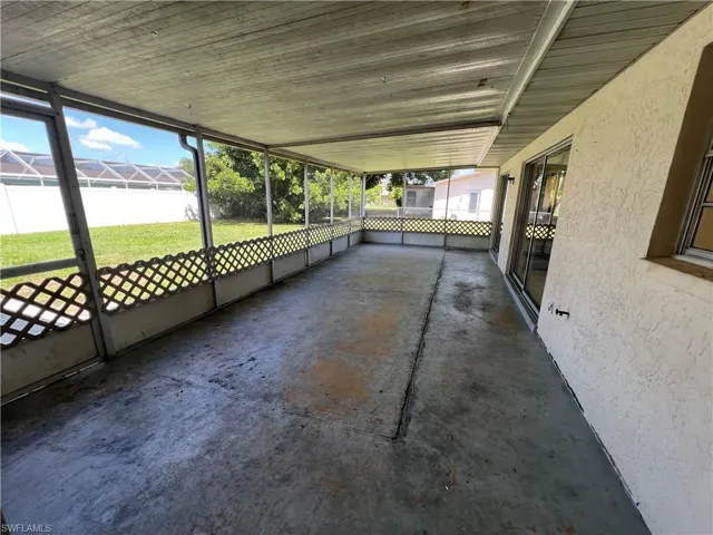 Unfurnished sunroom with a wealth of natural light