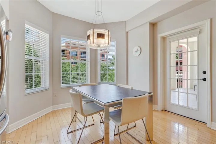 Dining space featuring plenty of natural light and light wood-style floors