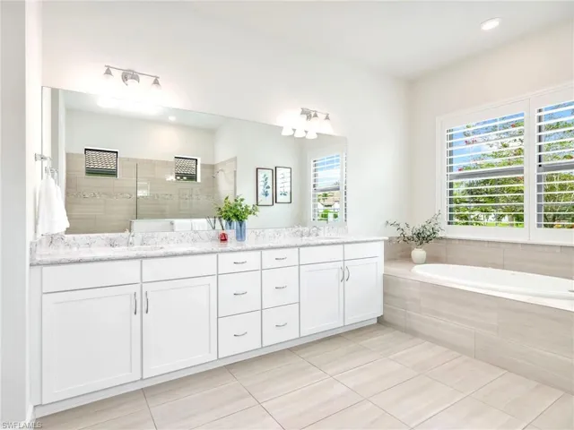 Primary Bathroom with Separate Tub and Double Vanity