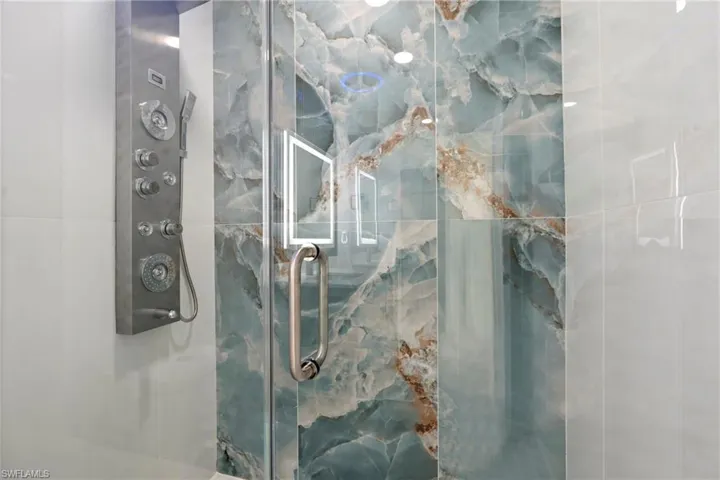Details featuring an enclosed shower