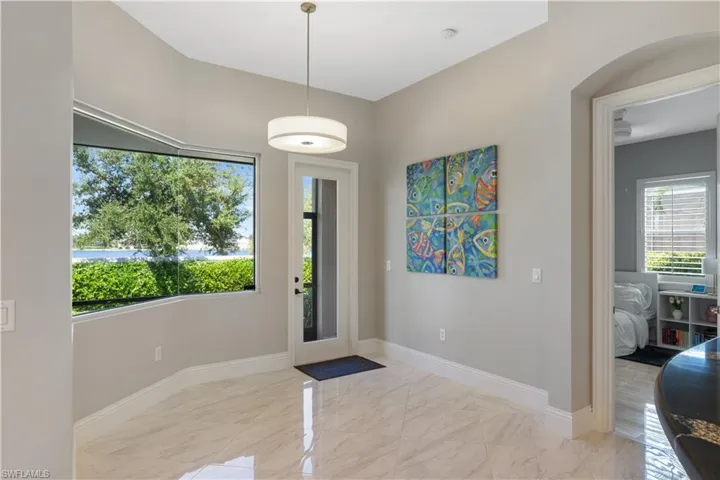 View of eat in kitchen area with 90 degree panoramic window