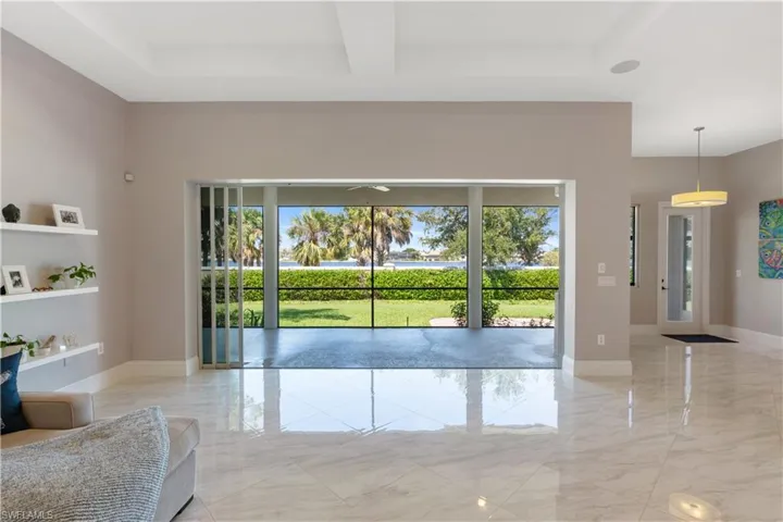 View of living room with full water view