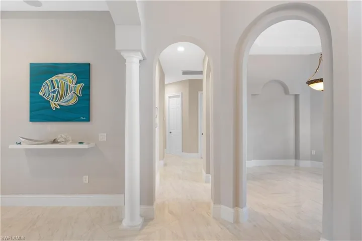 Corridor featuring ornate columns