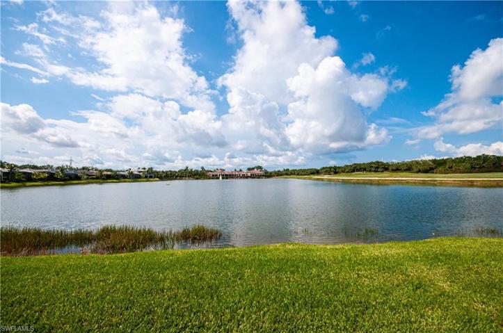 Miromar Golf Club house across the back yard and lake.