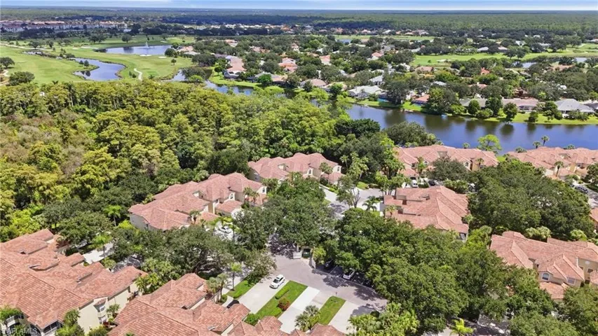 Community featuring extensive mature landscaping, multiple lakes, and golf course access