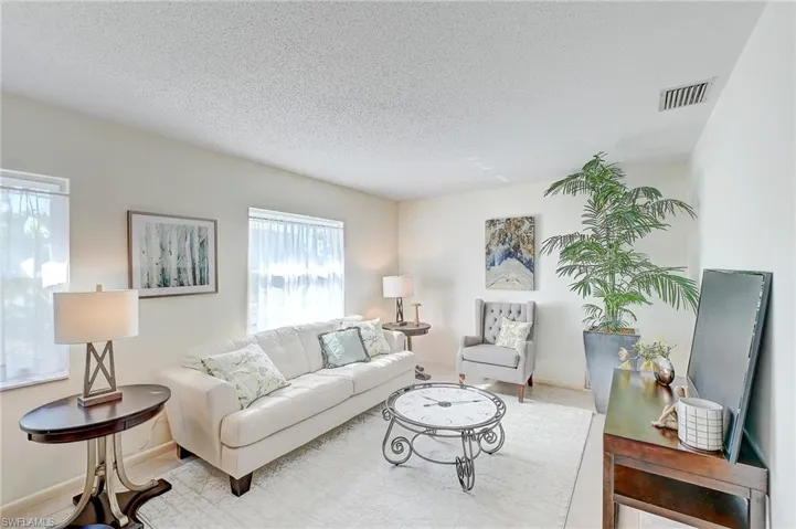 Living room with a textured ceiling