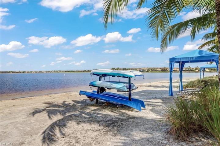 Private community beach with boating and sun bathing.