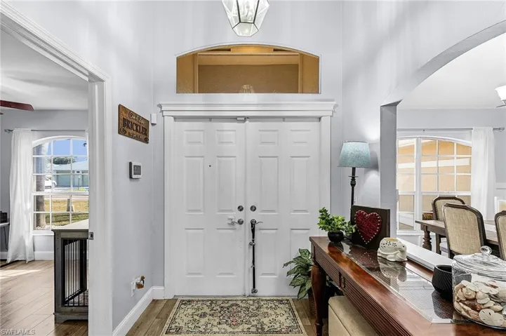 Foyer featuring wood-type flooring