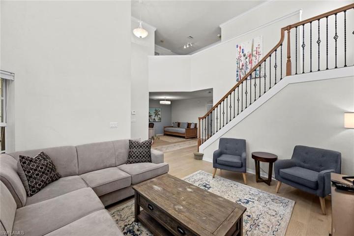 Front living area, staircase to 2nd level