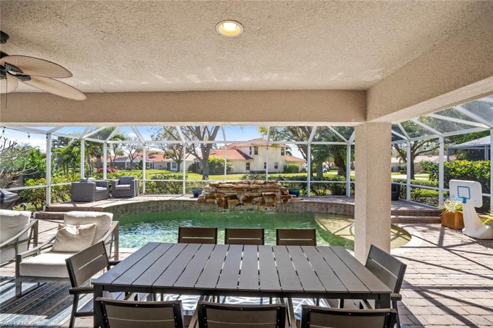 Covered lanai looking out to pool