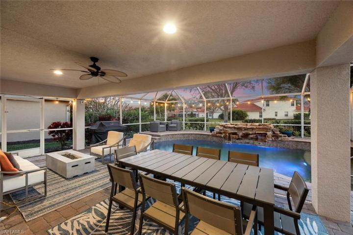 Covered space and pool at sunset