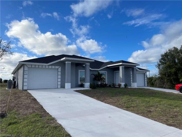 320-322  Ivan S AVE, LEHIGH ACRES, FL 33973