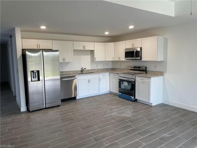 320-322  Ivan S AVE, LEHIGH ACRES, FL 33973