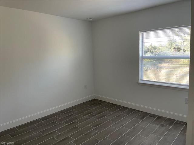 320-322  Ivan S AVE, LEHIGH ACRES, FL 33973