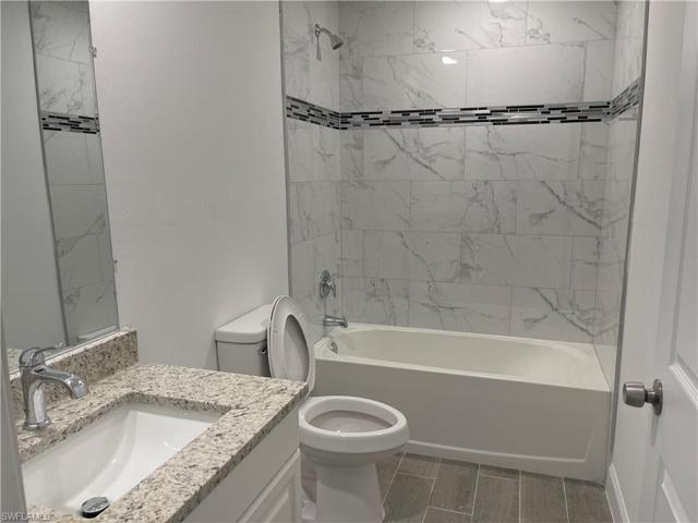 320-322  Ivan S AVE, LEHIGH ACRES, FL 33973