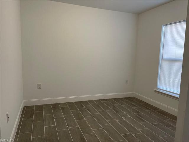 320-322  Ivan S AVE, LEHIGH ACRES, FL 33973