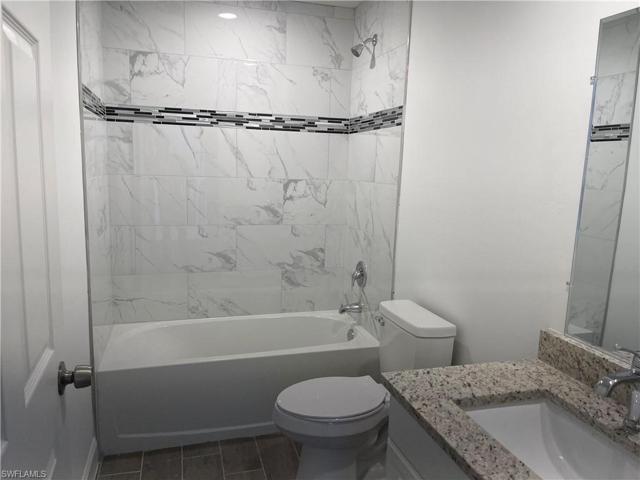 320-322  Ivan S AVE, LEHIGH ACRES, FL 33973
